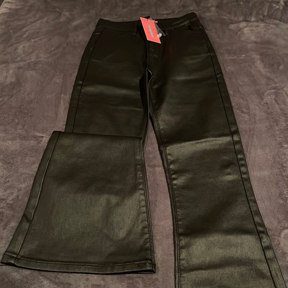 Black faux leather flare jeans